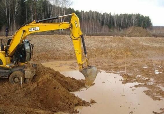 Строительство водоемов колесным экскаватором JCB