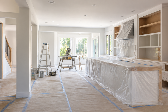 Clean home remodeling jobsite with floor and cabinet protection
