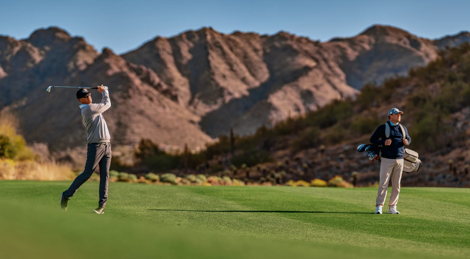Удар игрока клюшкой Titleist T150 T-Series