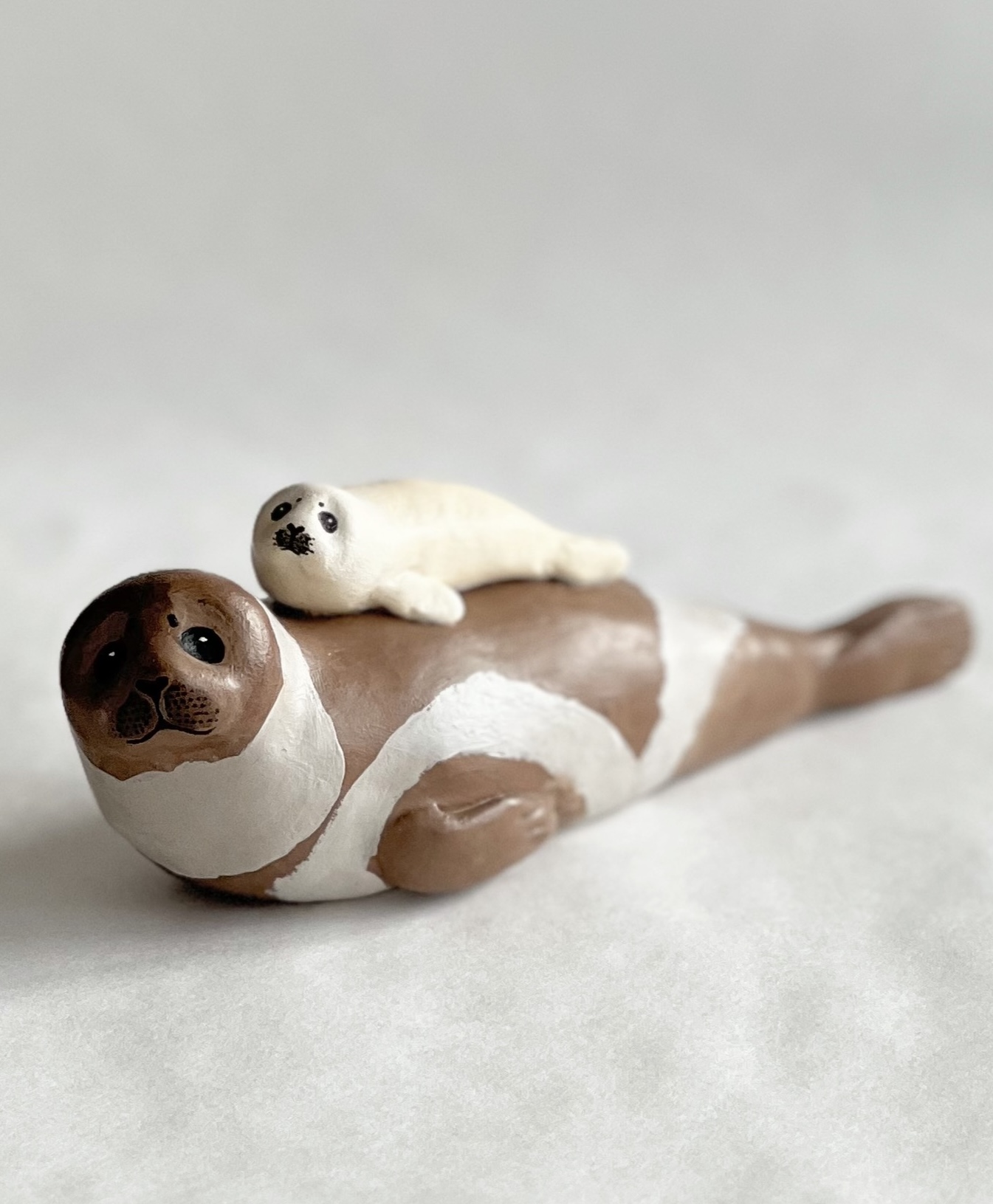 Mama seal and baby figurine