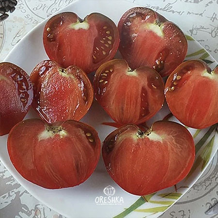 Purple heart tomato salad fresh slice purple-red colour plate