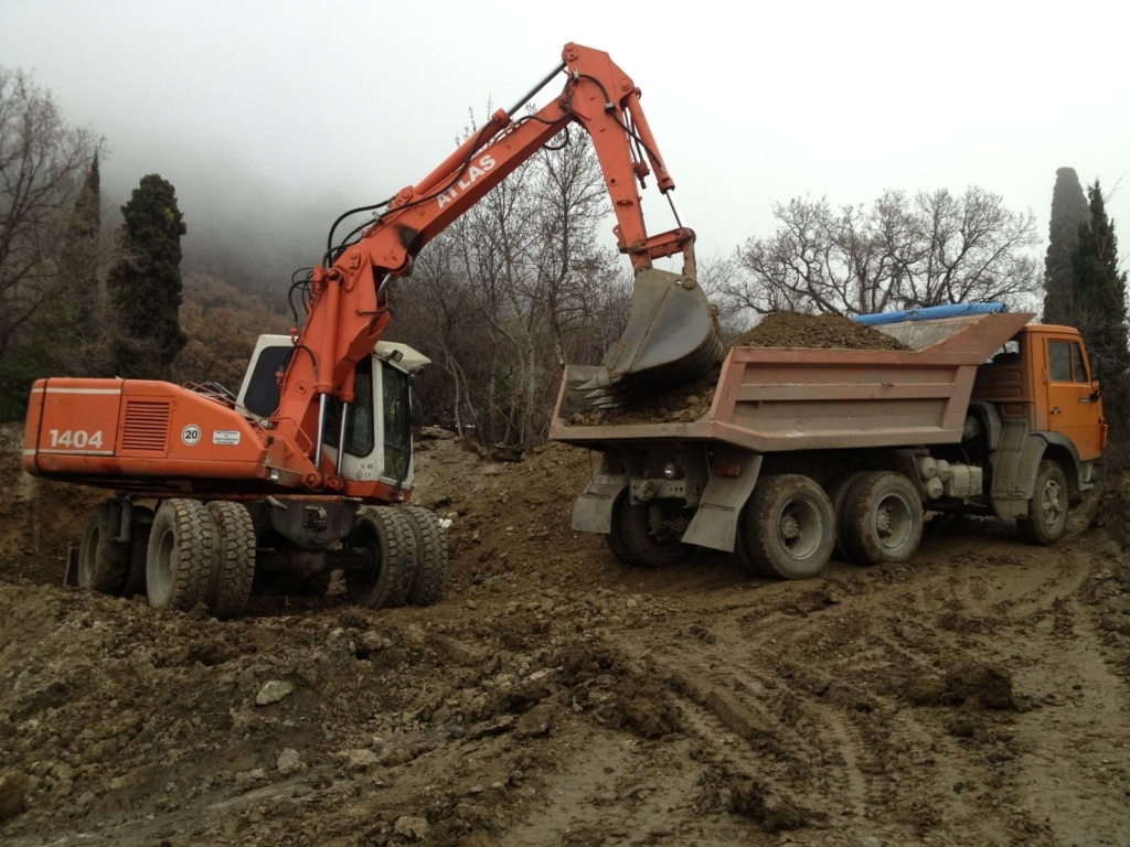 Вывоз и доставка грунта плодородного