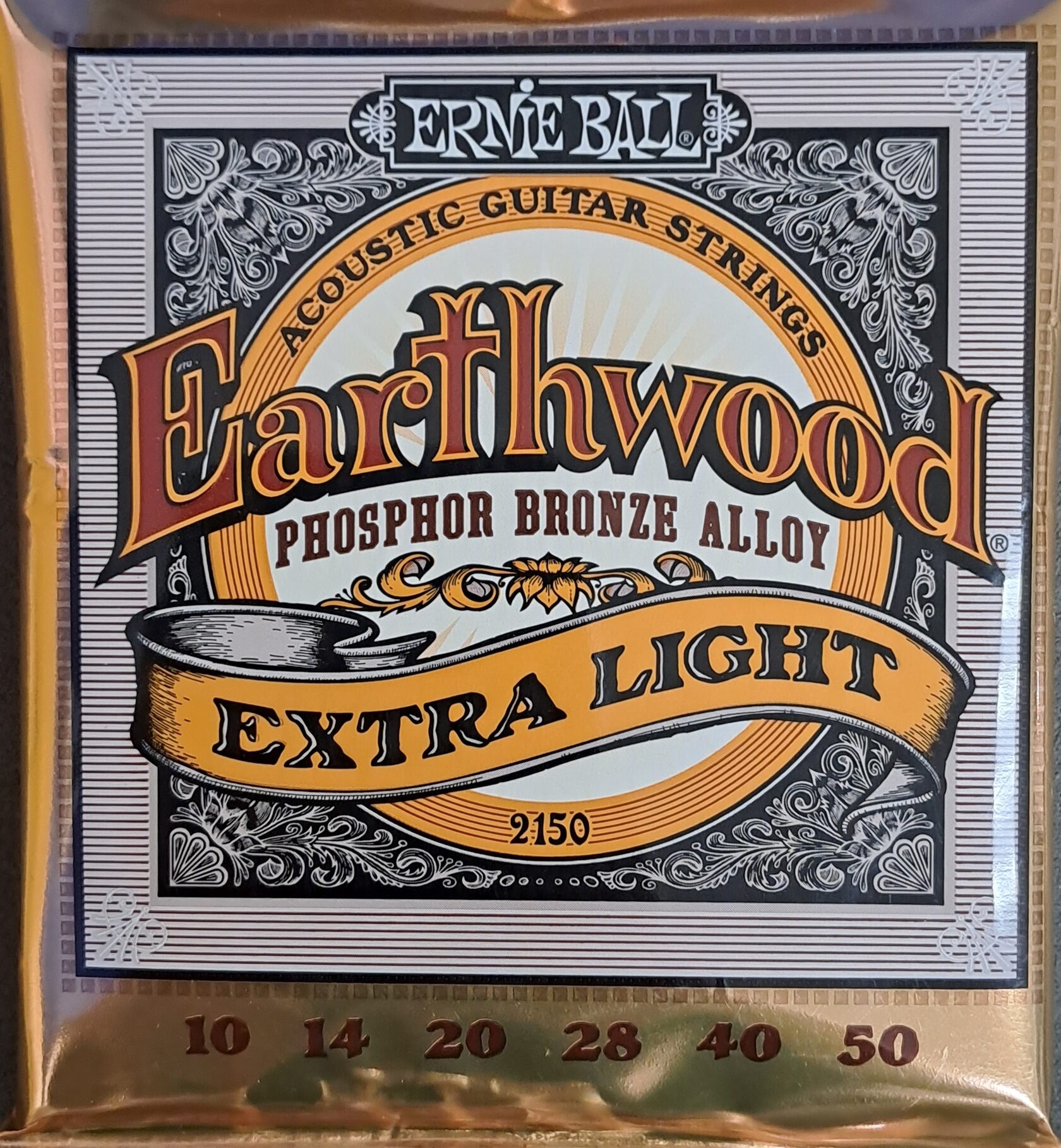 Струны ernie ball 10. Ernie Ball Earthwood Phosphor Bronze. Ernie Ball струны. Струны Earthwood Light. Струны Ernie Ball 2003.