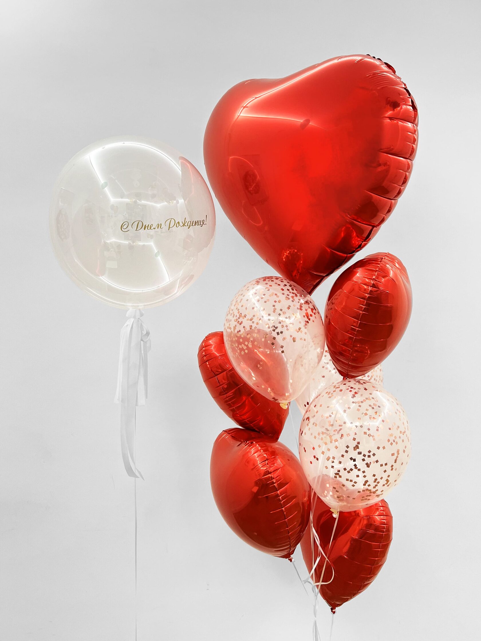 цена Фонтан из шаров «Алое сердце» - 10 шаров + шар Bubbles (сфера) - красные сердца конфетти