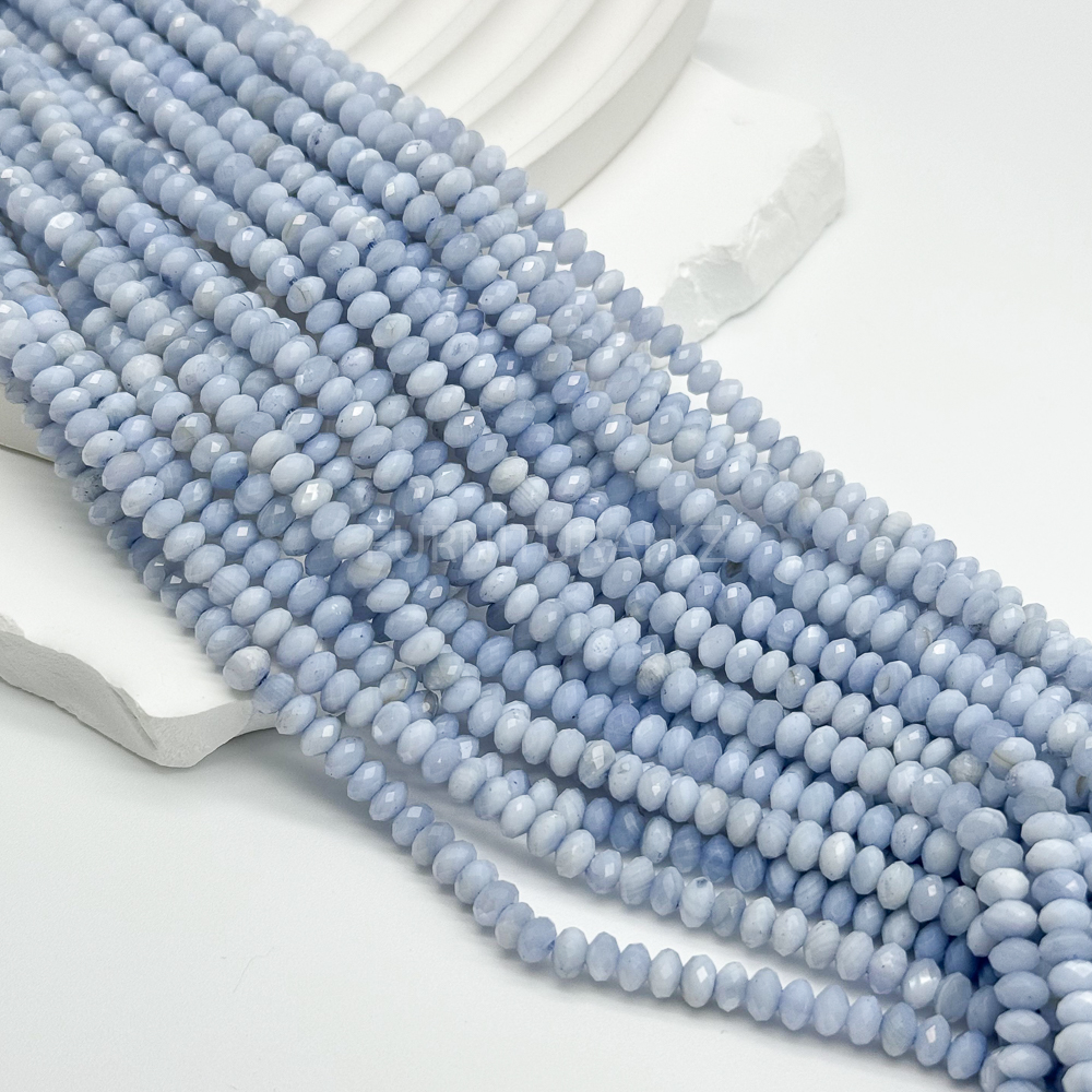 Перламутр Овальный, гранёный 3,5*5,5 мм.,(голубой) нить.