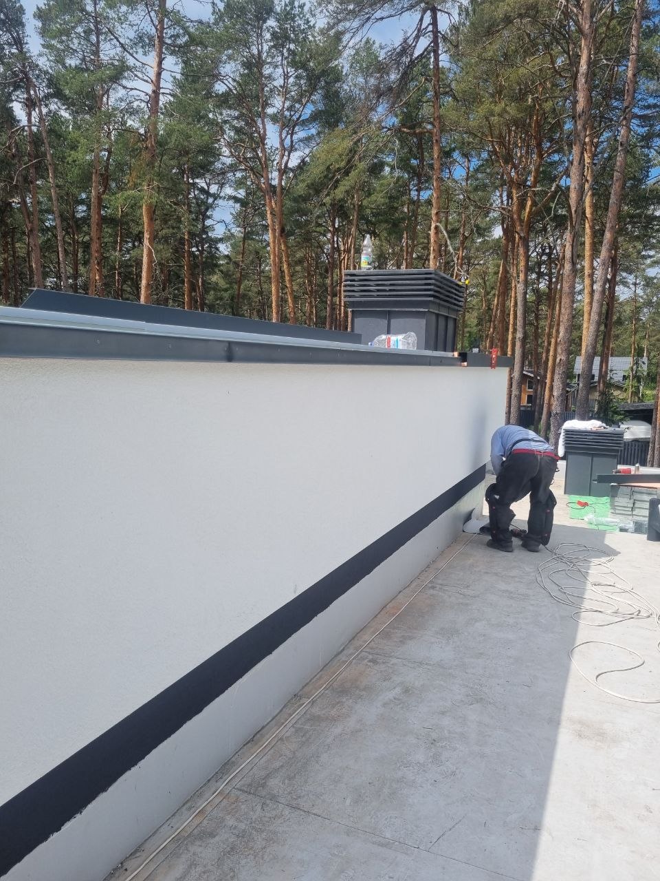 Работы по декоративной штукатурке фасада загородного дома