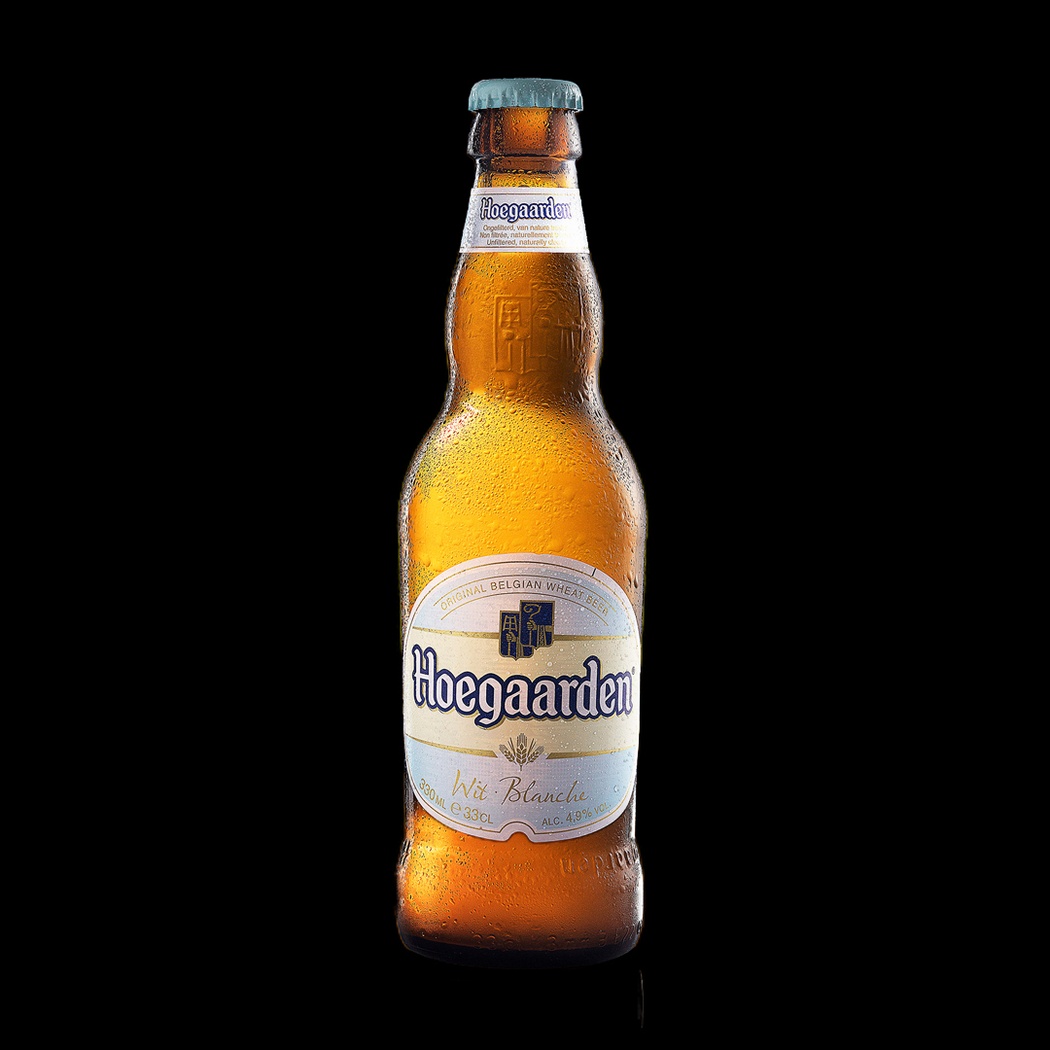 Hoegaarden. Пиво Хугарден пшеничное нефильтрованное. Пиво Хугарден белое 0,44. Пиво нефильтрованное бутылочное Хугарден. Хугарден светлое нефильтрованное.