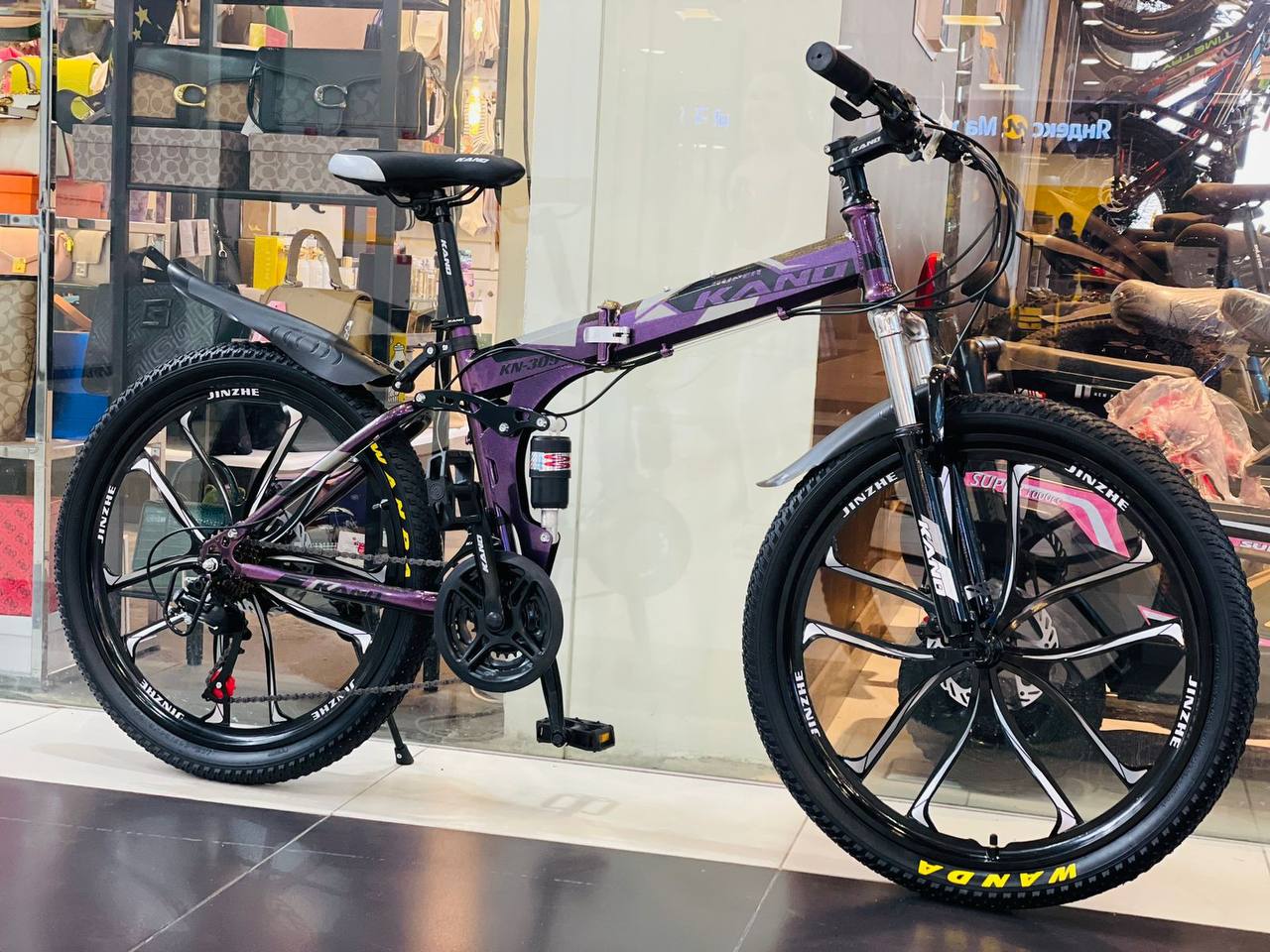 Складной подростковый велосипед на дисках KANO-309 24'' фиолетовый - Kano