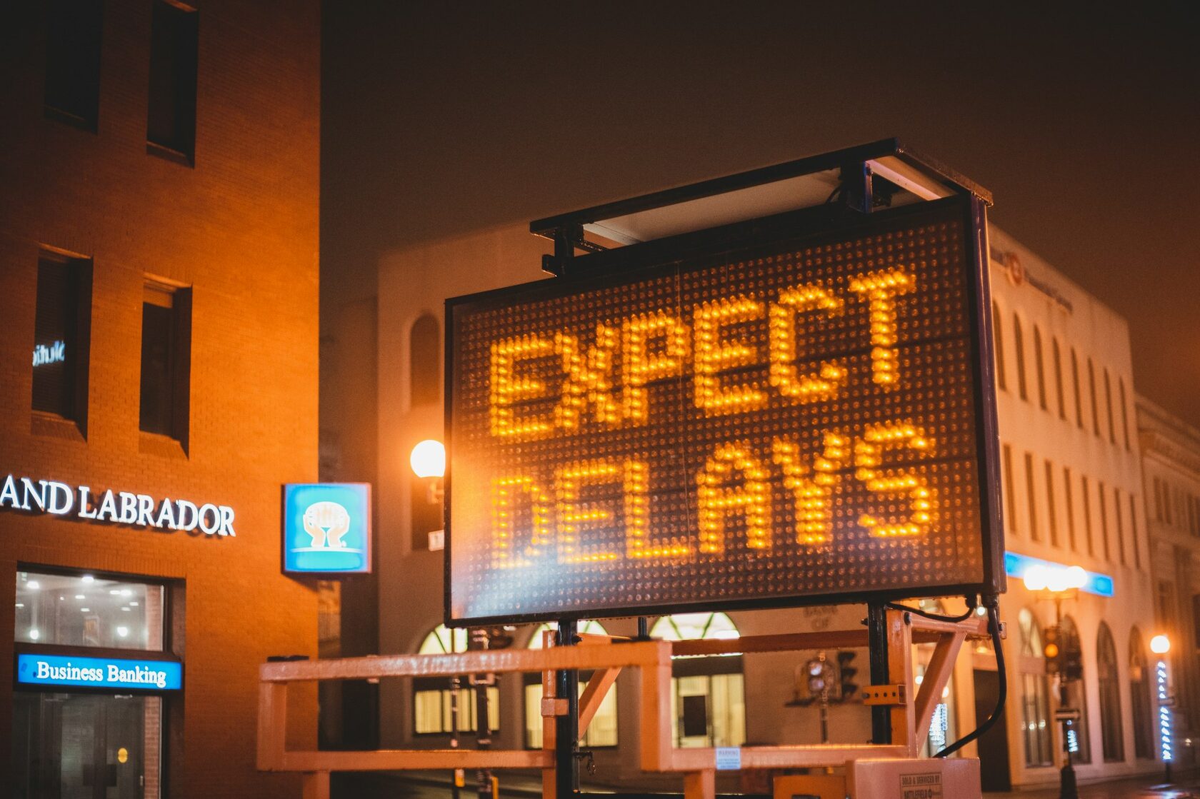 Delayed flight sign with a clock