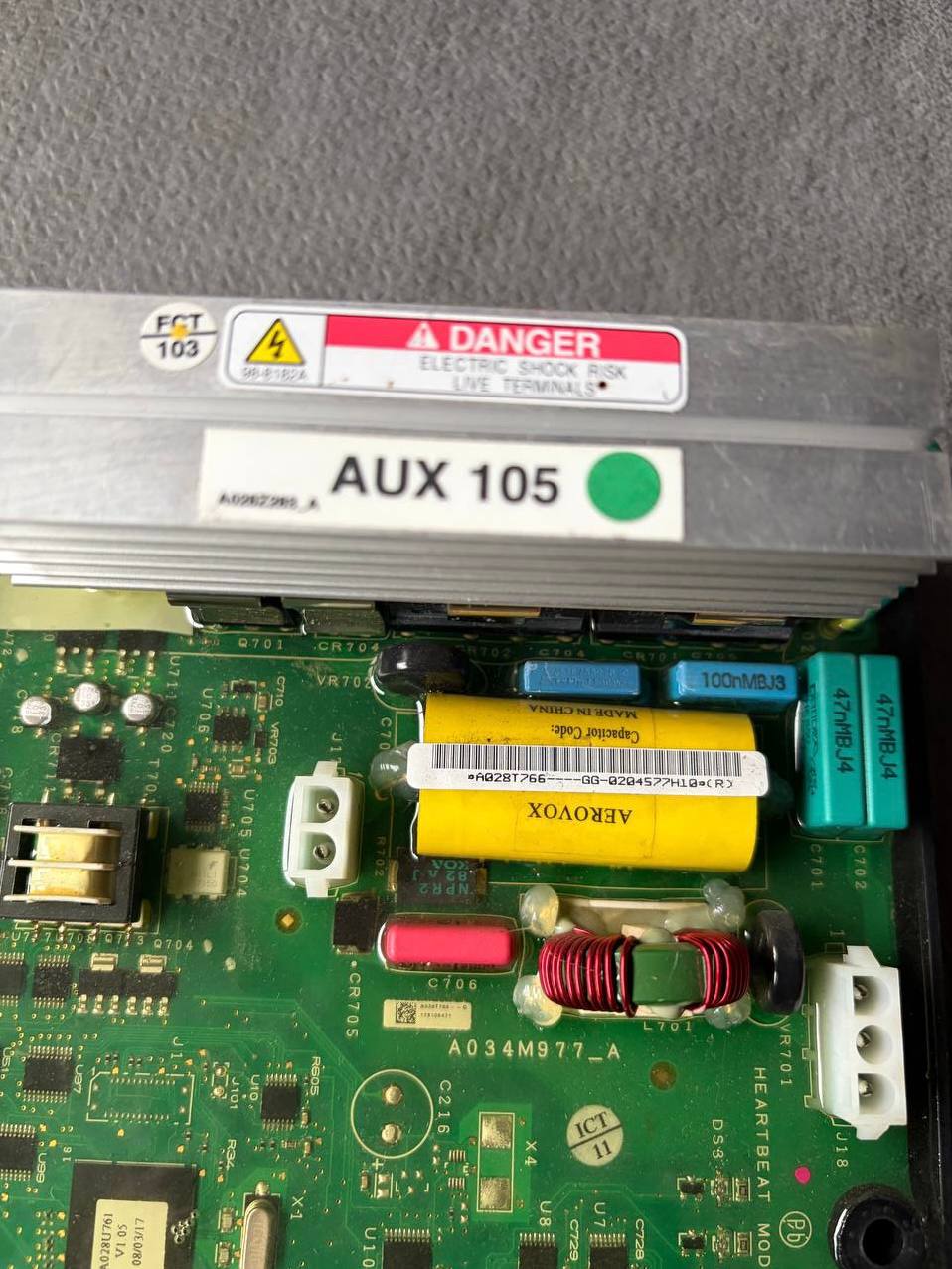 Маркировка AUX 105, A028T766 и A034M977-A на плате Cummins