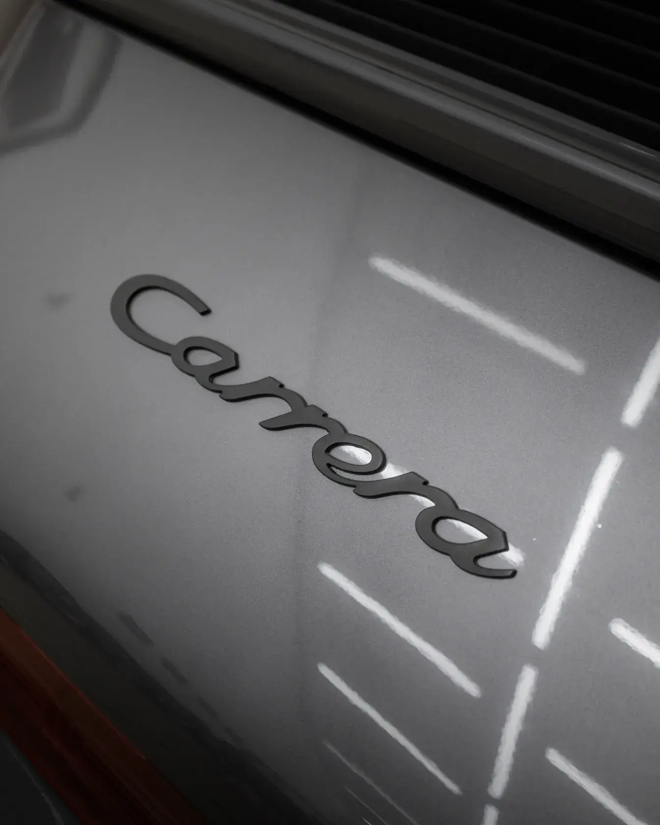 Шильдик Carrera на Porsche 911 1986