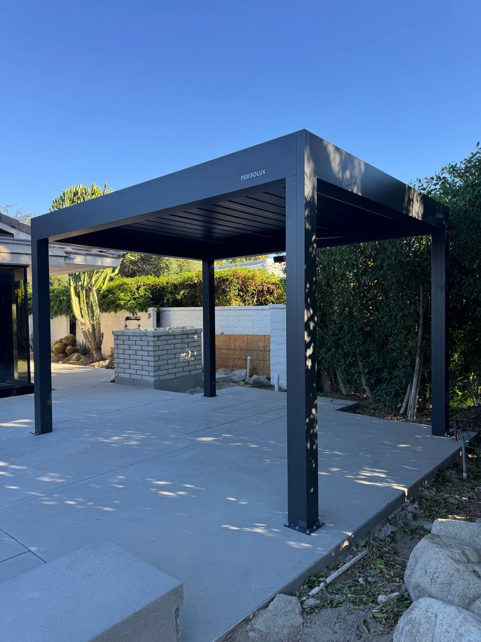 Completed four-post motorized aluminum pergola in Lake Forest