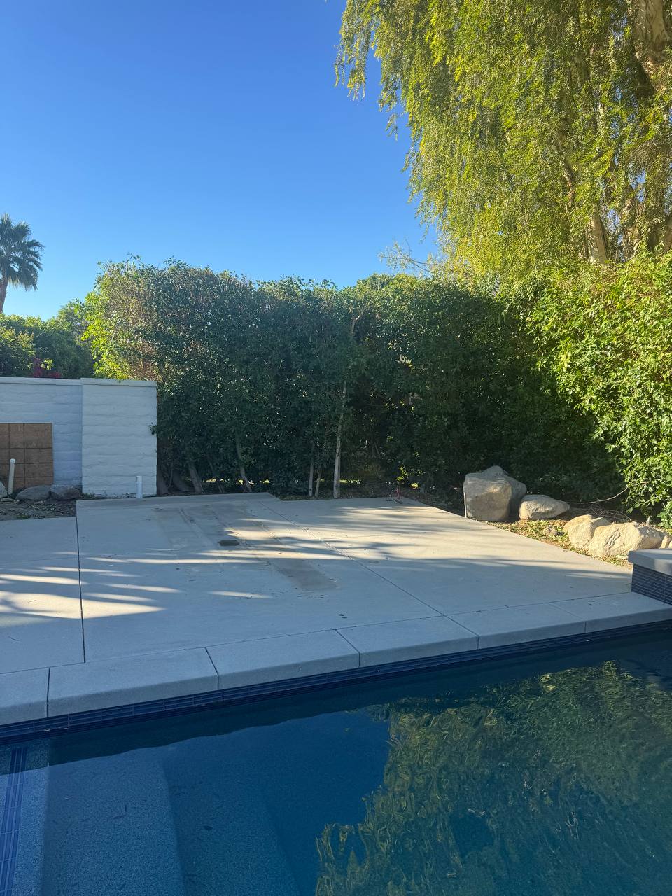 Existing Lake Forest poolside patio before pergola installation