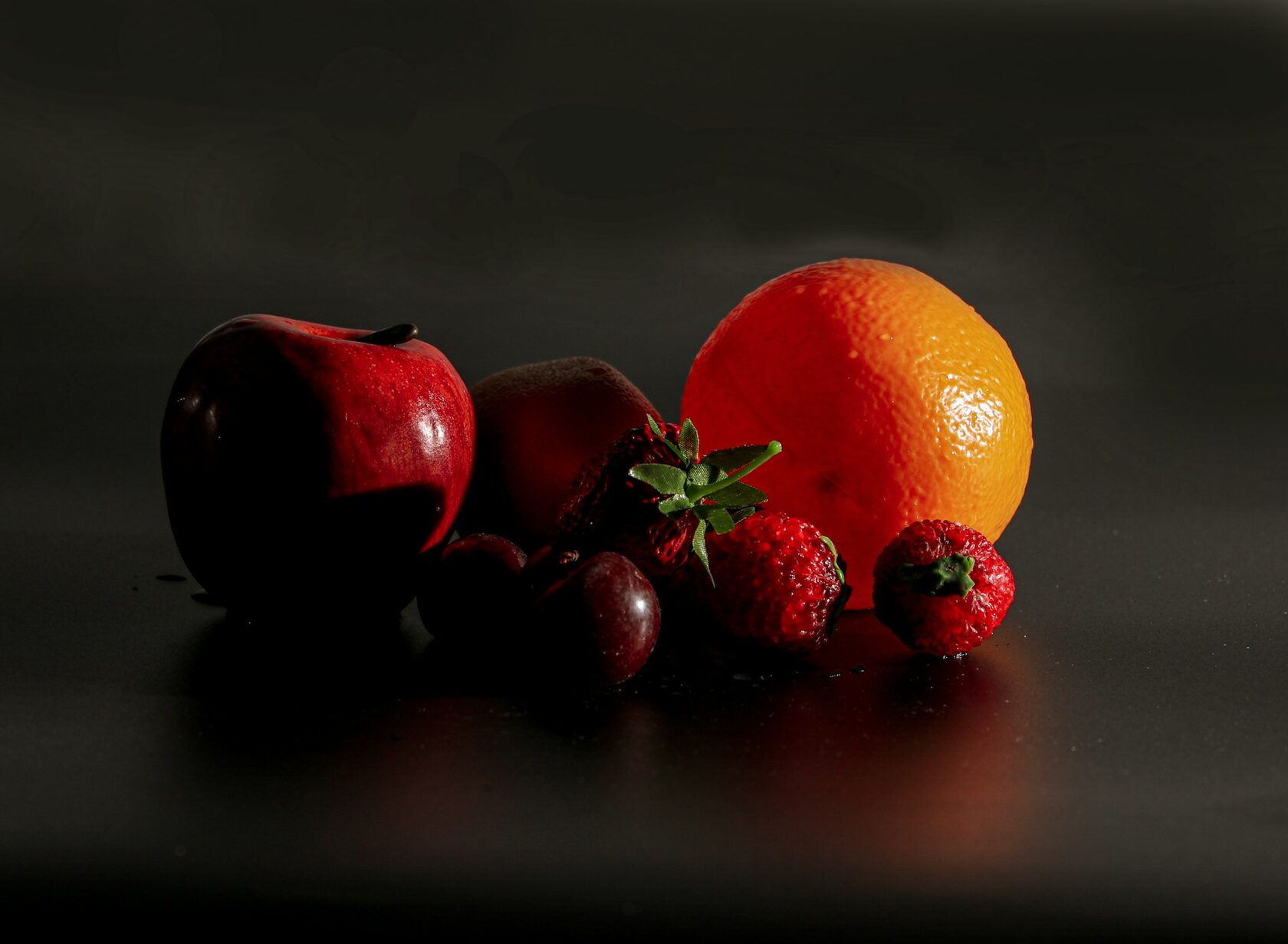 Selected objects arranged on a dark surface