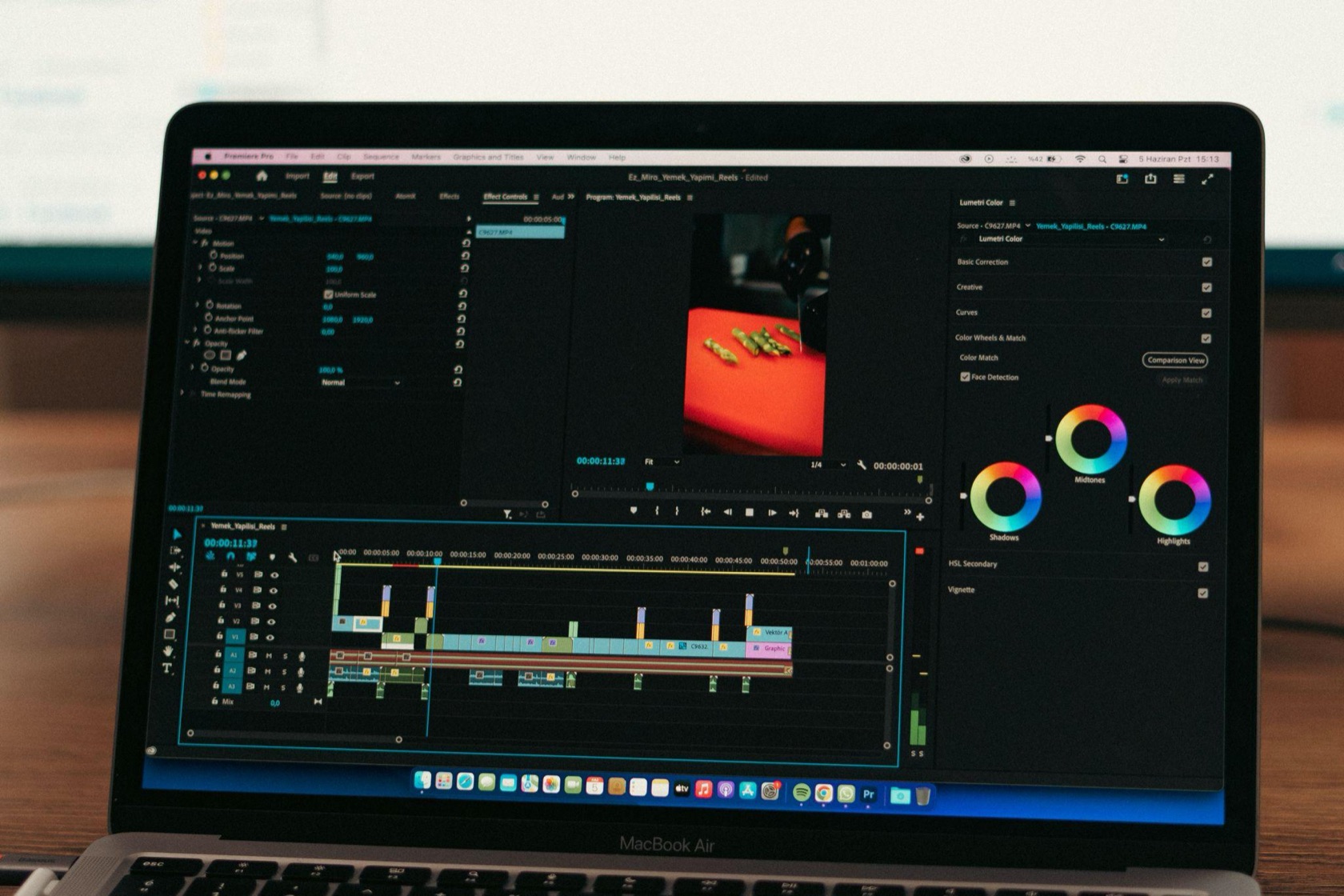 Video editing timeline open on a laptop screen