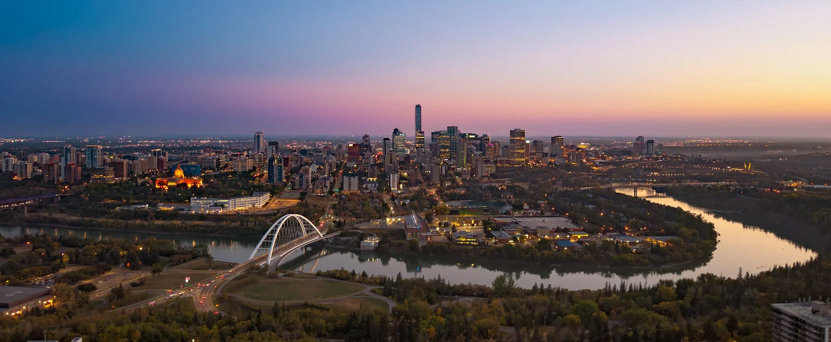 Edmonton skyline and river at sunset in Alberta.