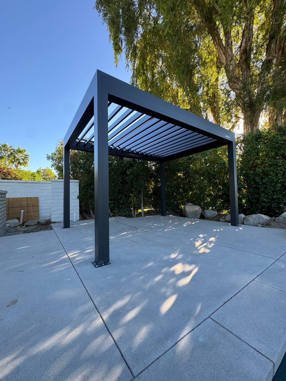 Completed Lake Forest pergola with motorized louvers open