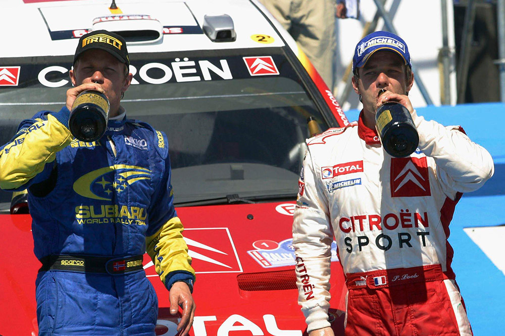 Обладатель второго места на ралли Сардиния 2005 Петтер Сольберг (Subaru) и победитель Себастьен Лёб (Citroën)