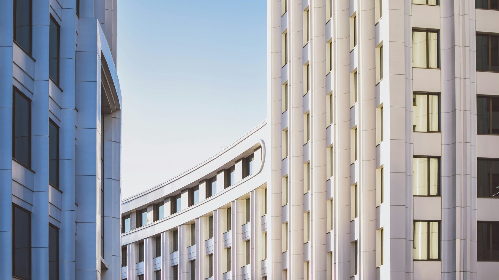 Modern white curved building facade