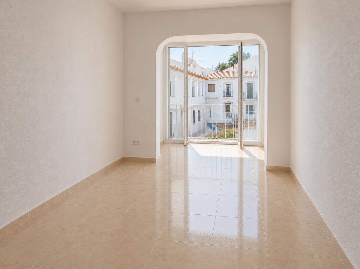 Salón con jardín antes de la renovación