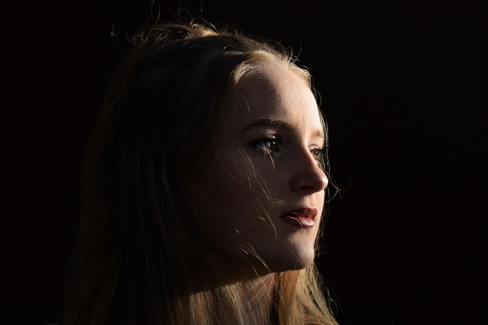 Maison Silence — moody portrait with water on skin