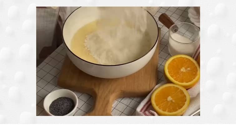 Приготовление апельсиновых оладий на кефире с маком: шаг 3