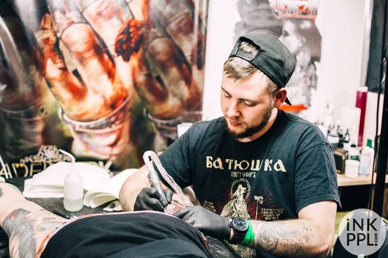 Andrey Kolbasin tattooing a client during the Milan Tattoo Convention 2016, 616