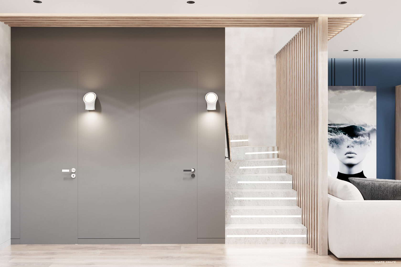Escalier vers l’étage avec portes invisibles intégrées dans un intérieur épuré