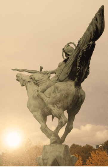 Sculpture of a man on a horse with wings