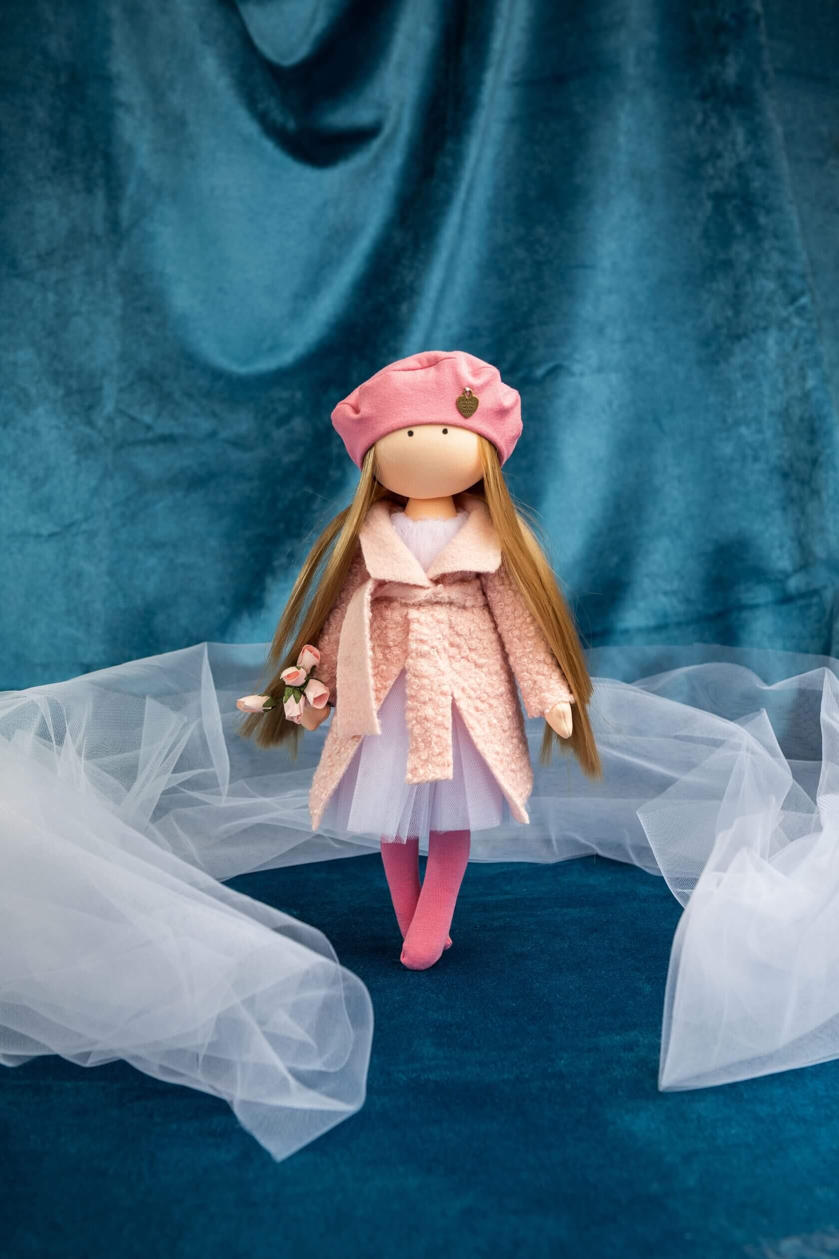 DIY textile sewing doll kit with pink hat coat and flowers