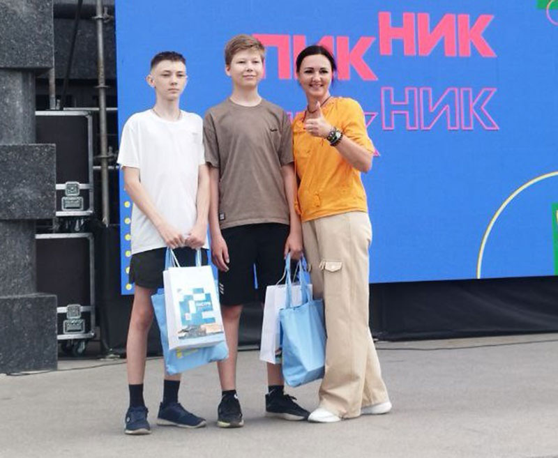 Project winners Egor Akimkin and Artem Kornilov get awarded at The City is Us festival