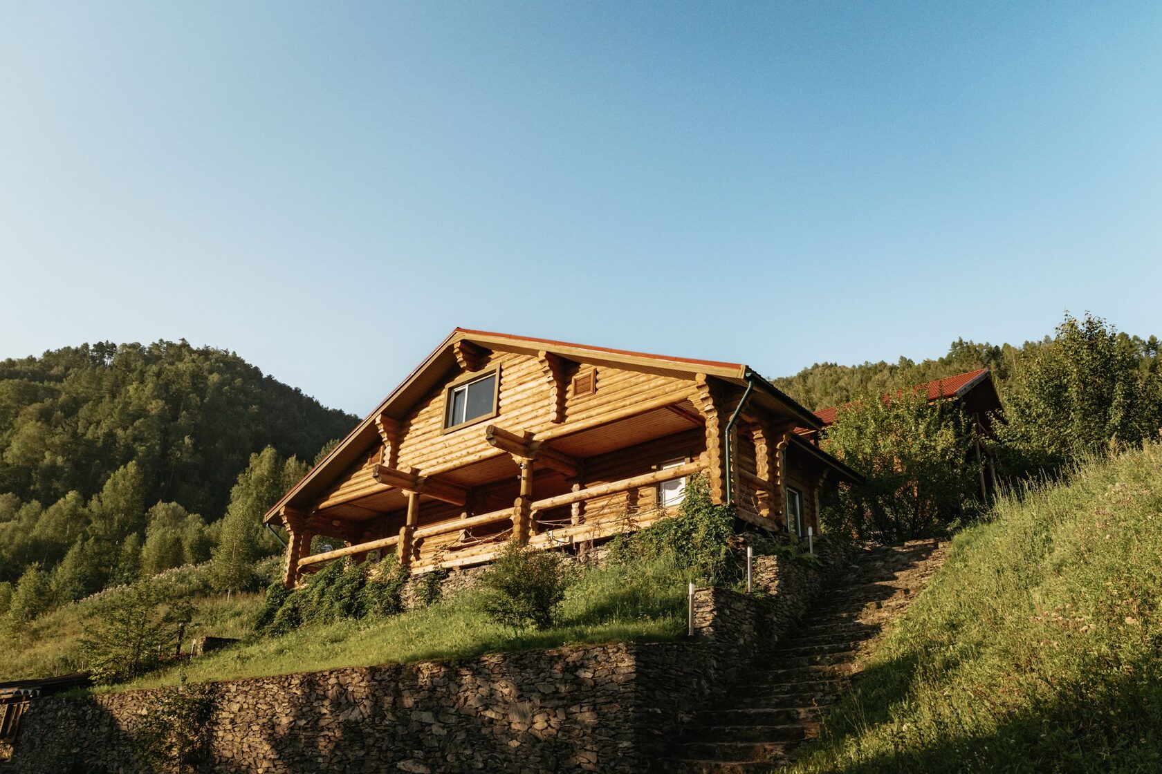 Carved log cabin balcony detail