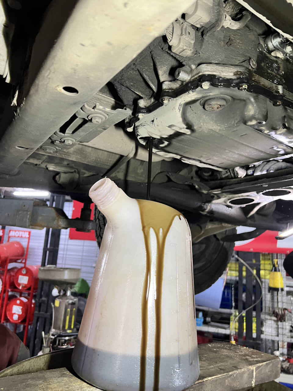 Слив старого масла AISIN