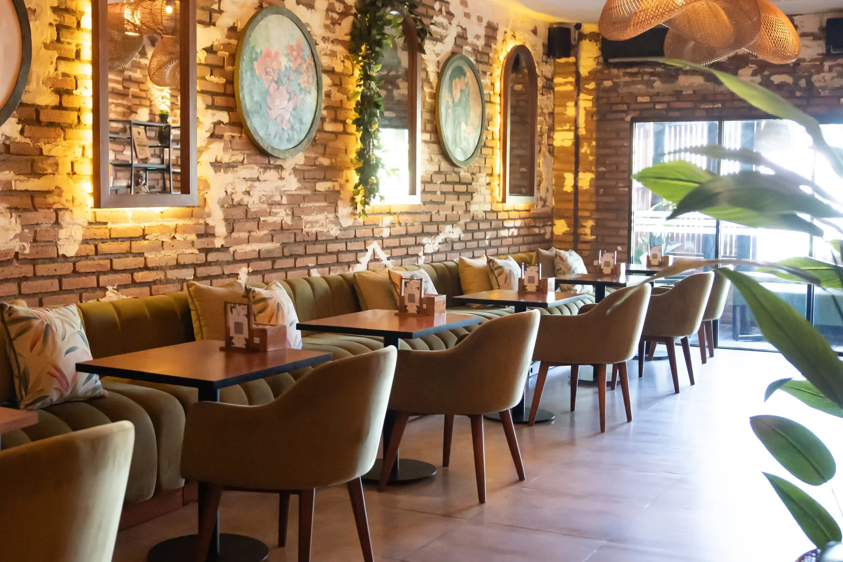 Eden Hookah Club Seminyak dining area with warm lighting and comfortable lounge seating
