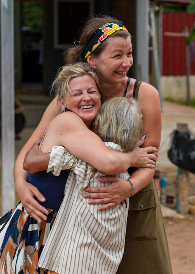 A quiet moment of connection between travelers and locals