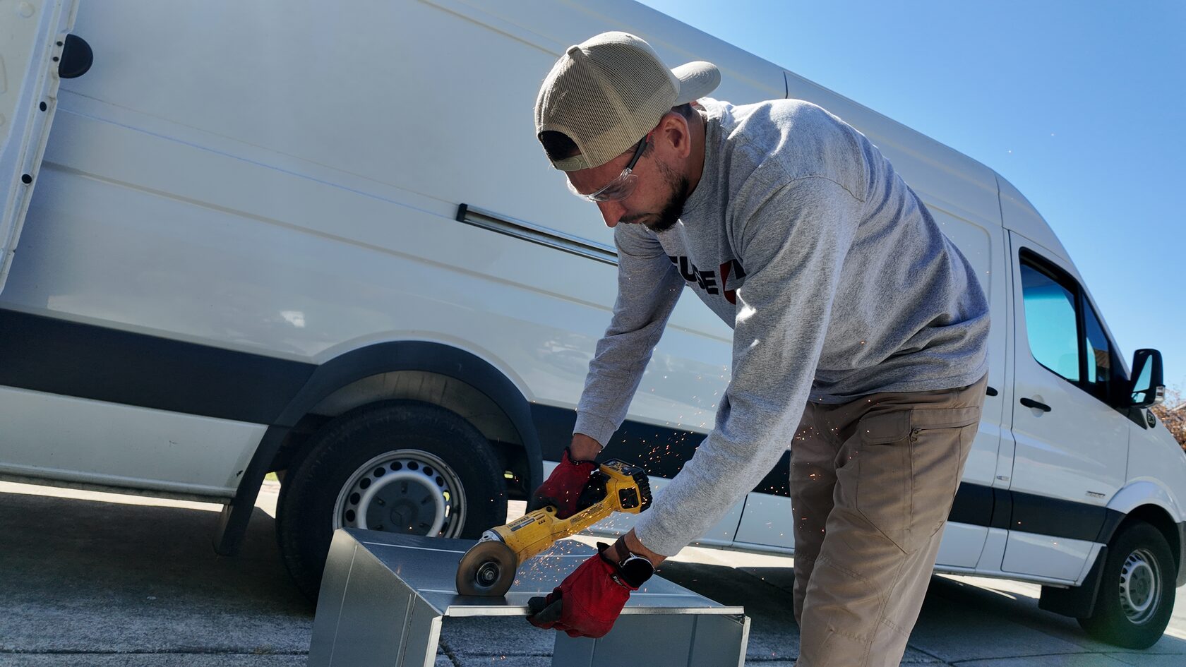 Technician servicing a unit to fix issues causing air conditioner smells