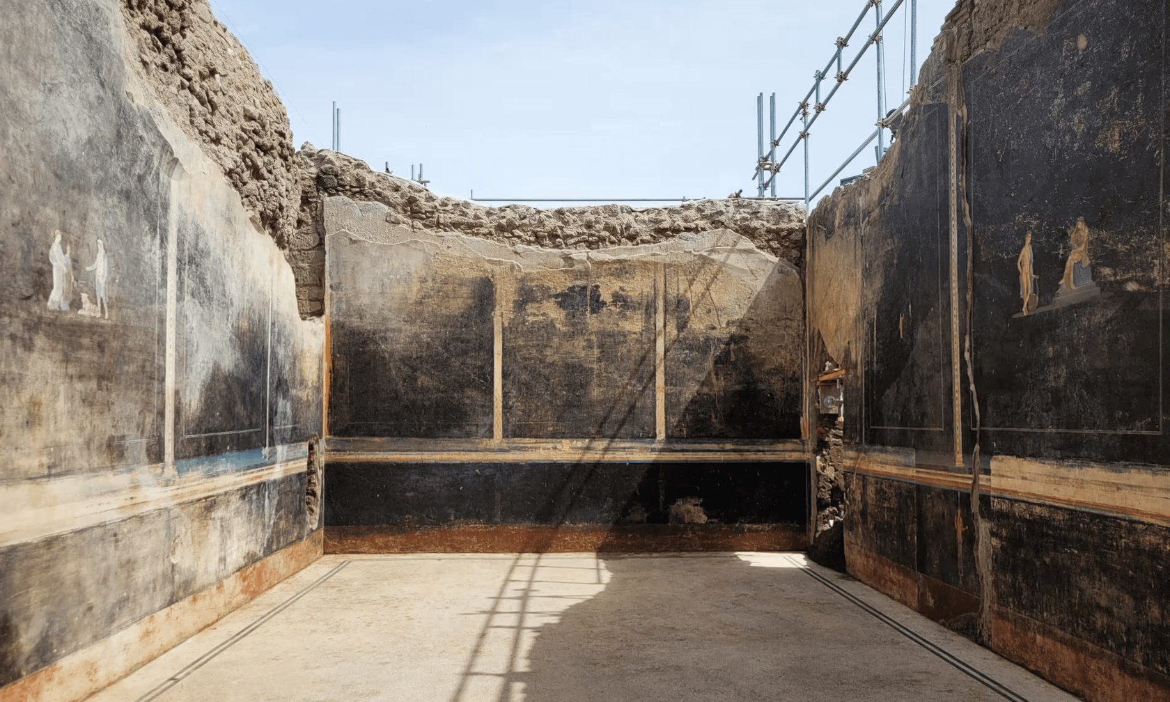 The ‘black room’ discovered in Pompeii. Photograph: Parco Archeologico Di Pompei/Reuters