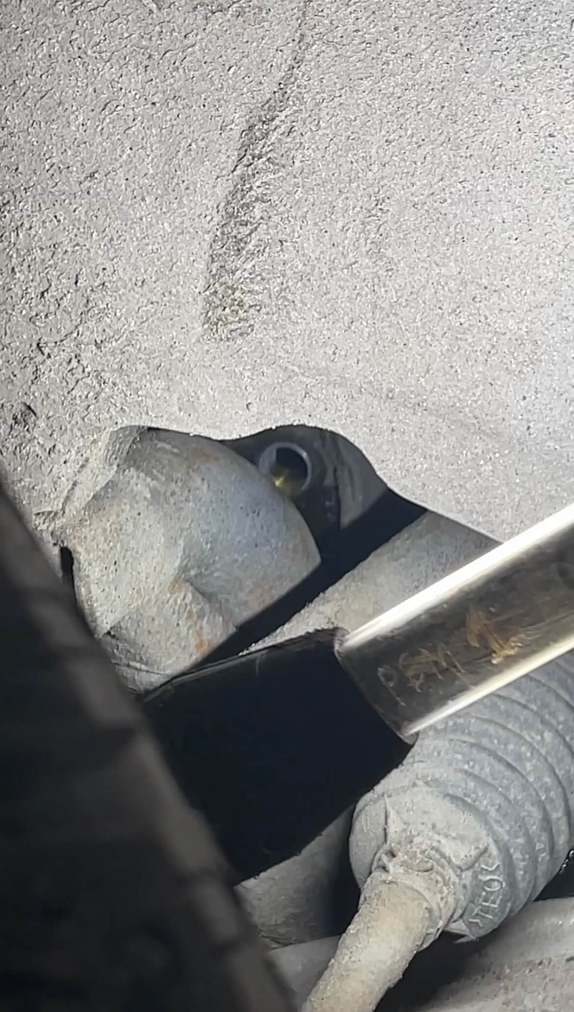 Проверка уровня масла после доливки