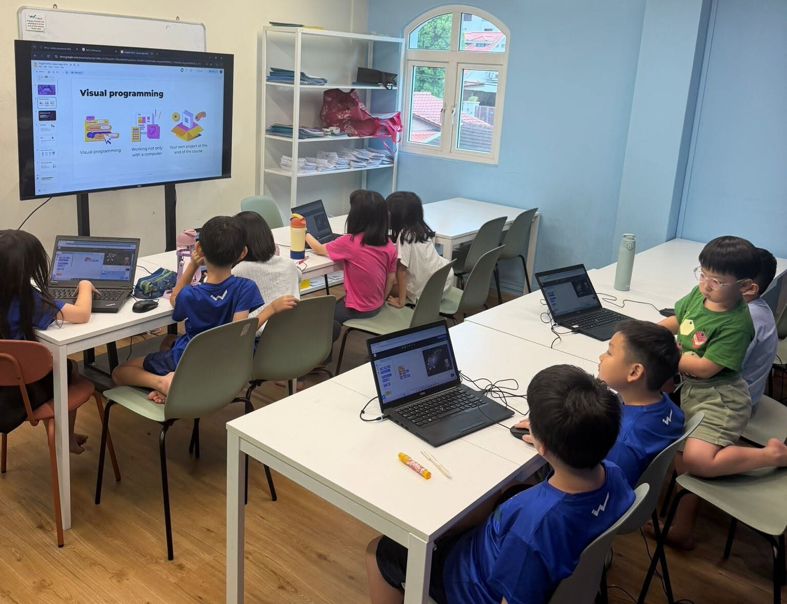Algorithmics Singapore students coding at Lorna Whiston Student Care