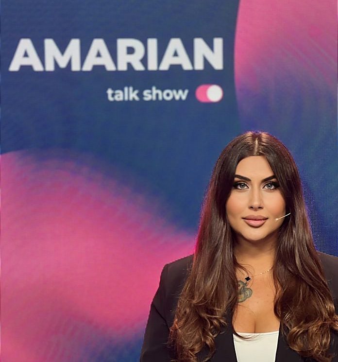 Arusiak Amarian on the Amarian Talk Show set