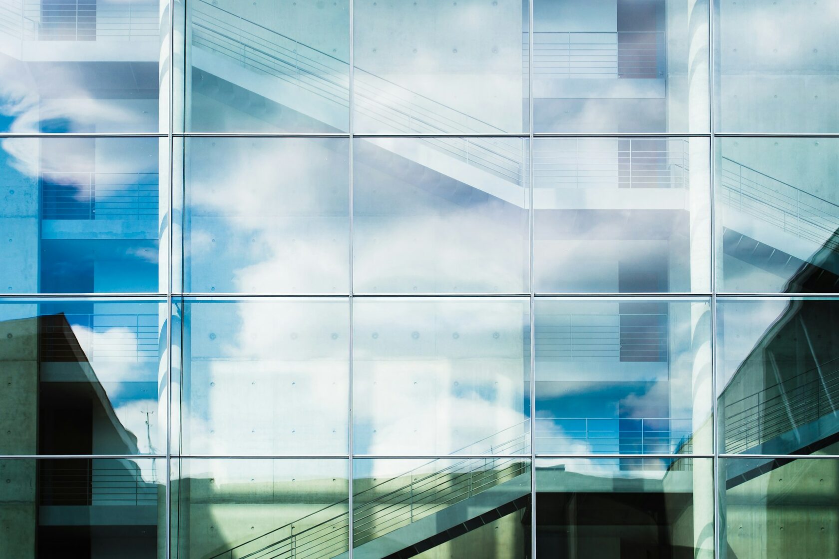 Glass building reflection sky