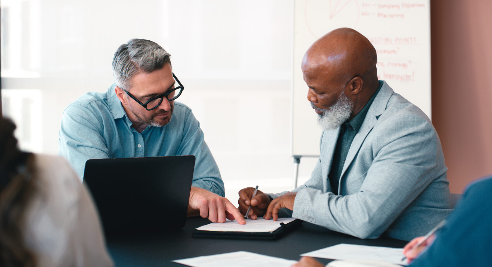 corporate attorney drafting and reviewing shareholders agreements