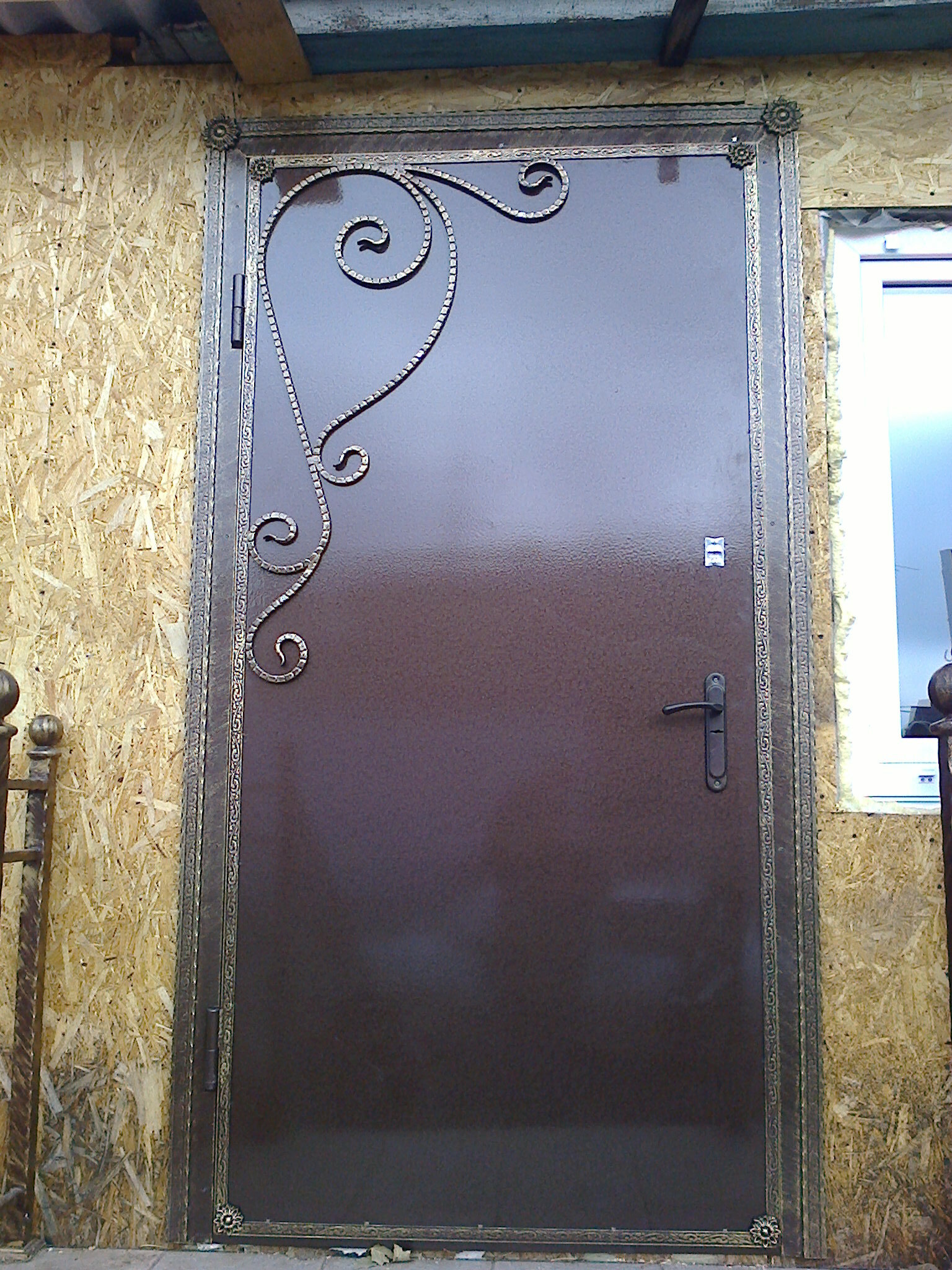 фото кованных дверей входных железных