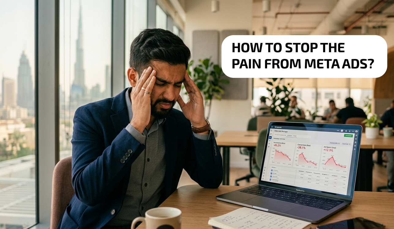 Frustrated entrepreneur looking at declining ad metrics on laptop