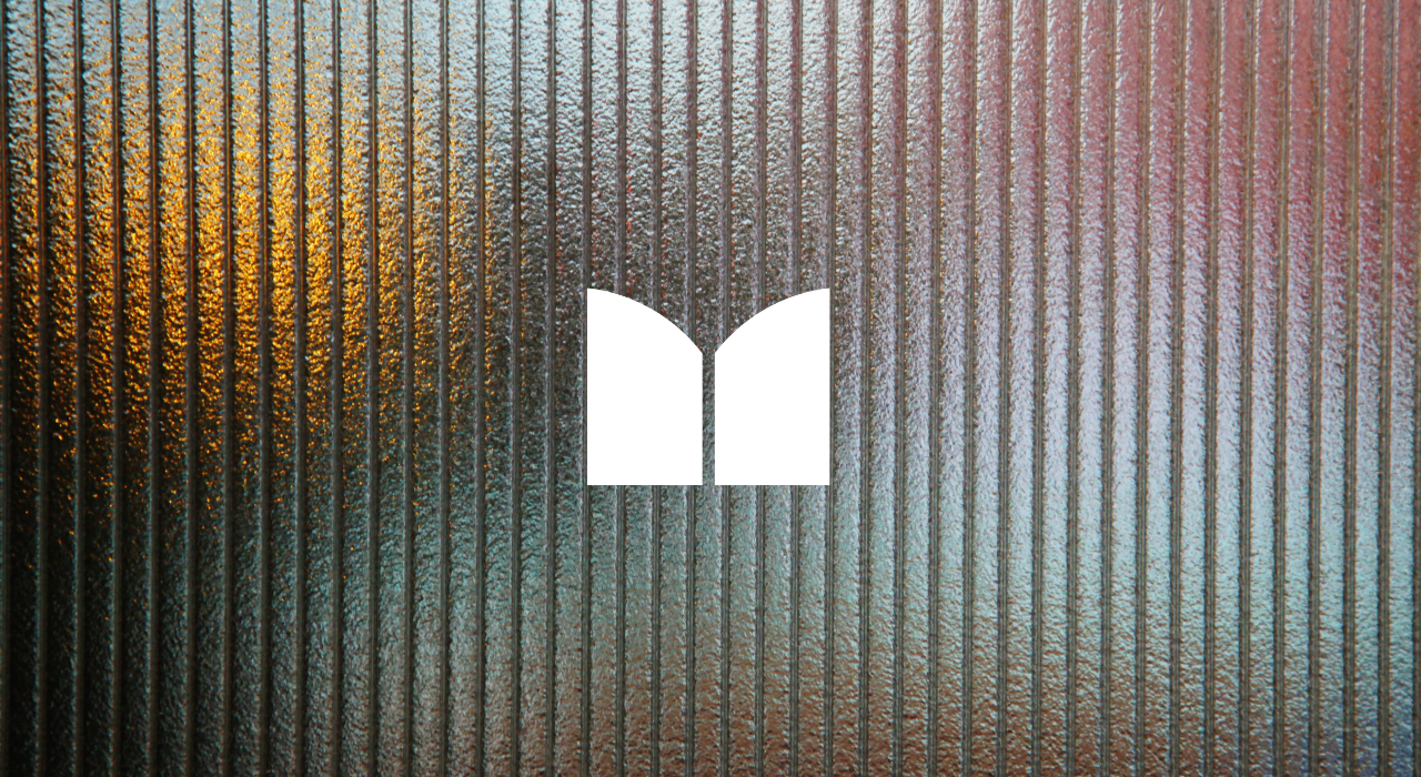 Minimalist logo illustration by Leragraphics placed on a textured, colored glass background for an article about timeless logo design.