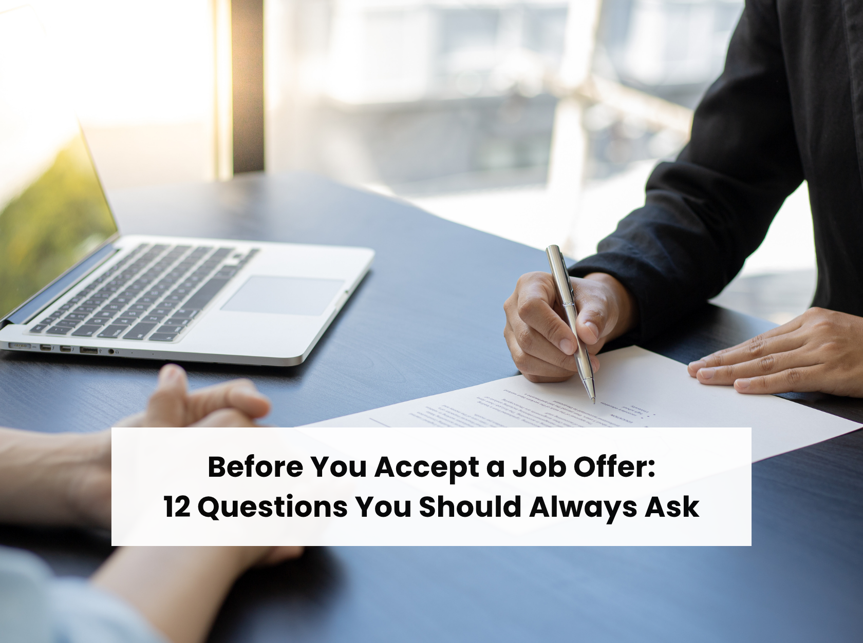 Job seeker reviewing a job offer and discussing important questions before accepting the position