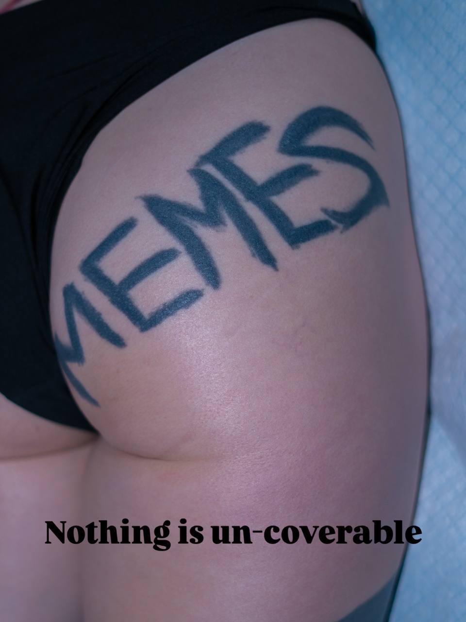 Large black tattoo of Memes on buttock, Los Angeles, West Hollywood