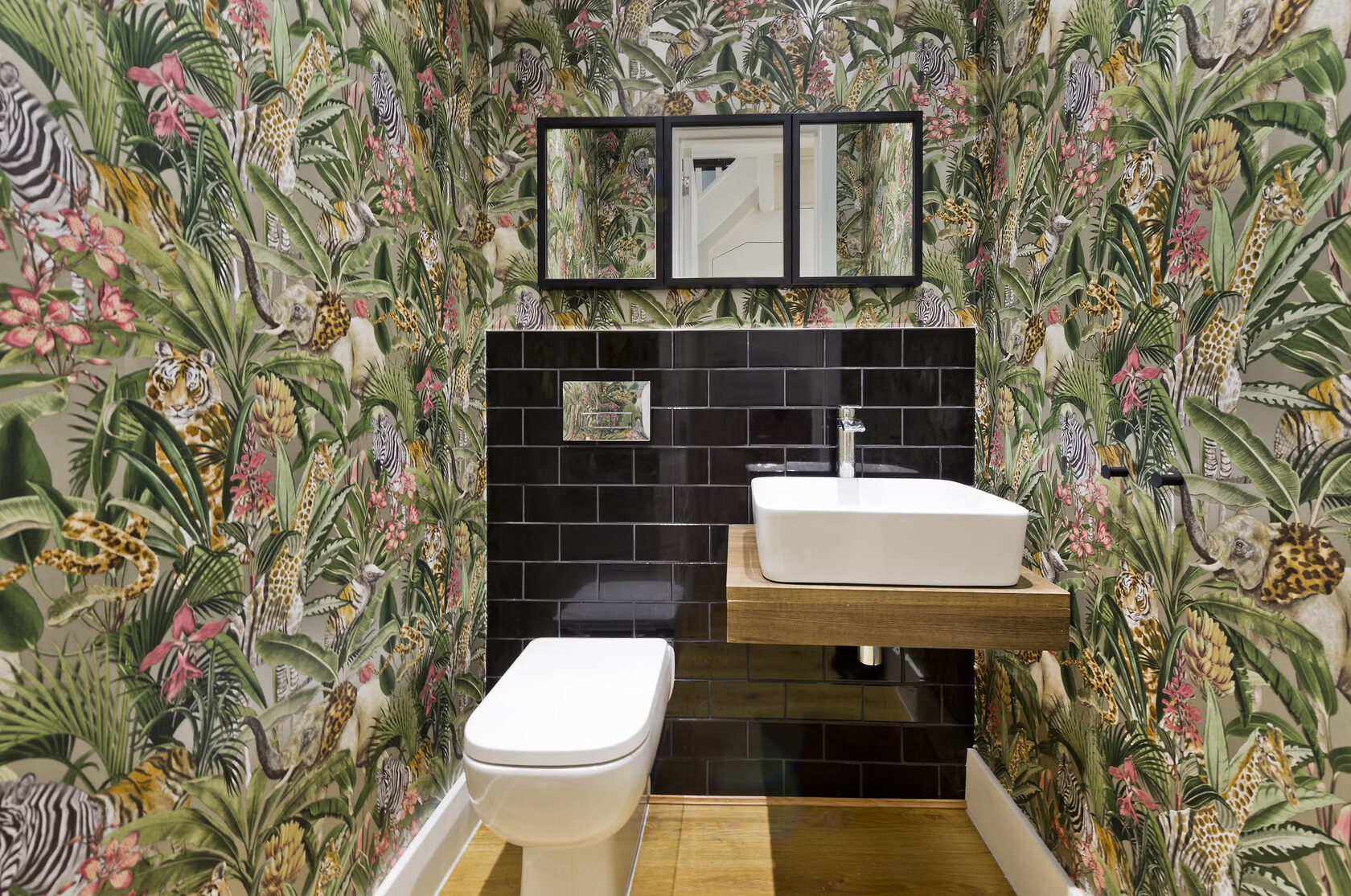 Silverton Road cloak room. Patterned wallpaper.