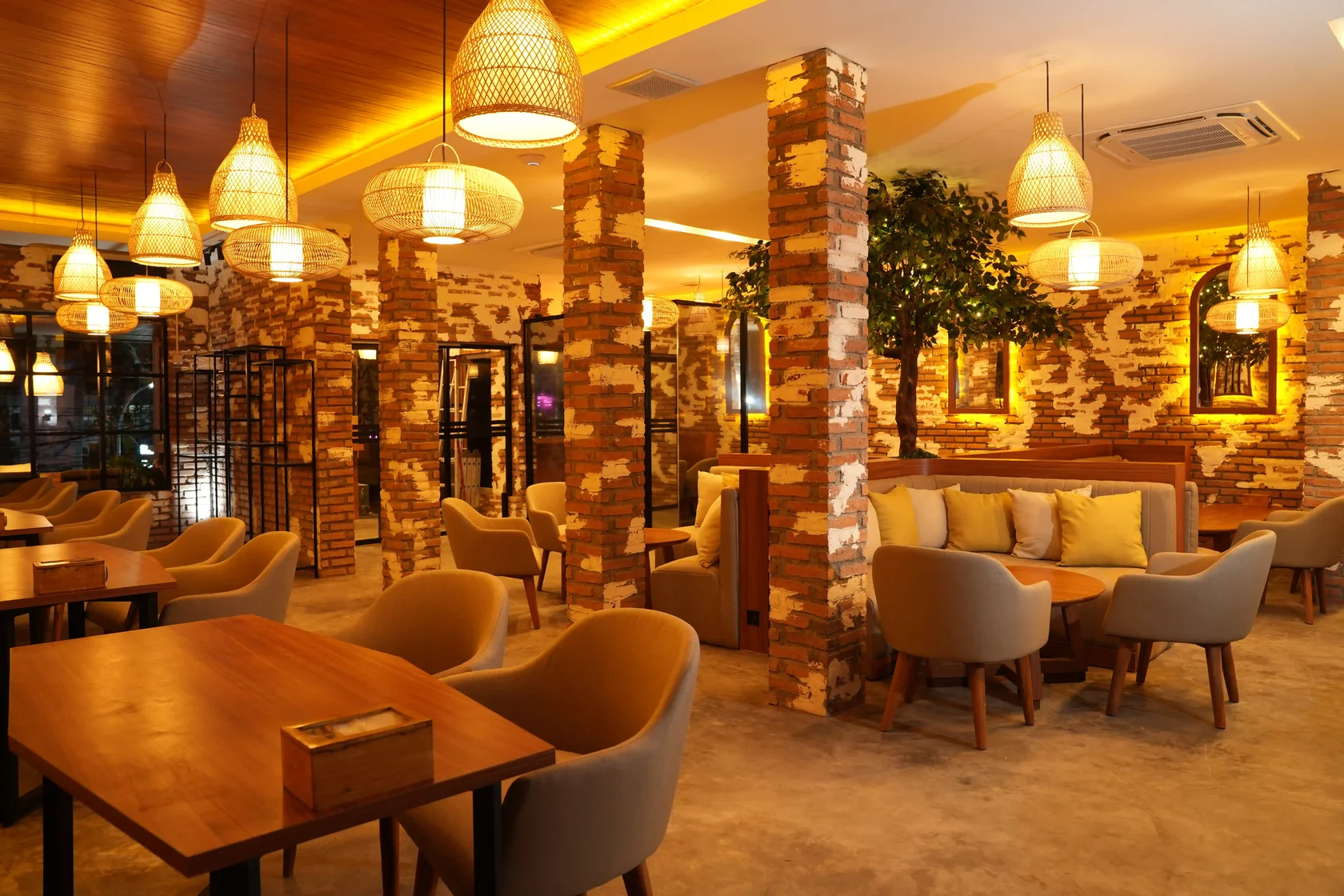 Warm and sophisticated dining area at Eden Lounge Seminyak designed for an intimate shisha date.