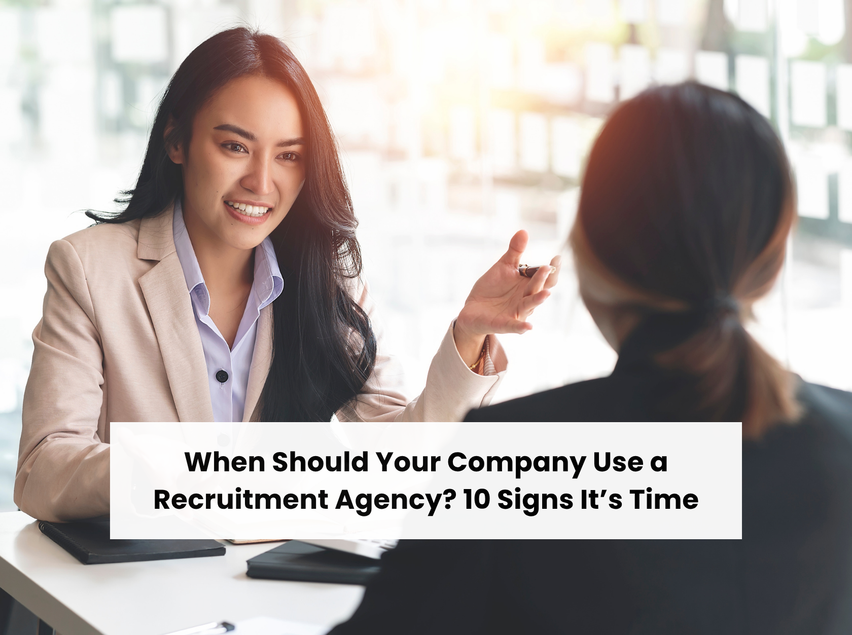 Employer discussing hiring needs with a recruitment agency to find suitable candidates in the UAE